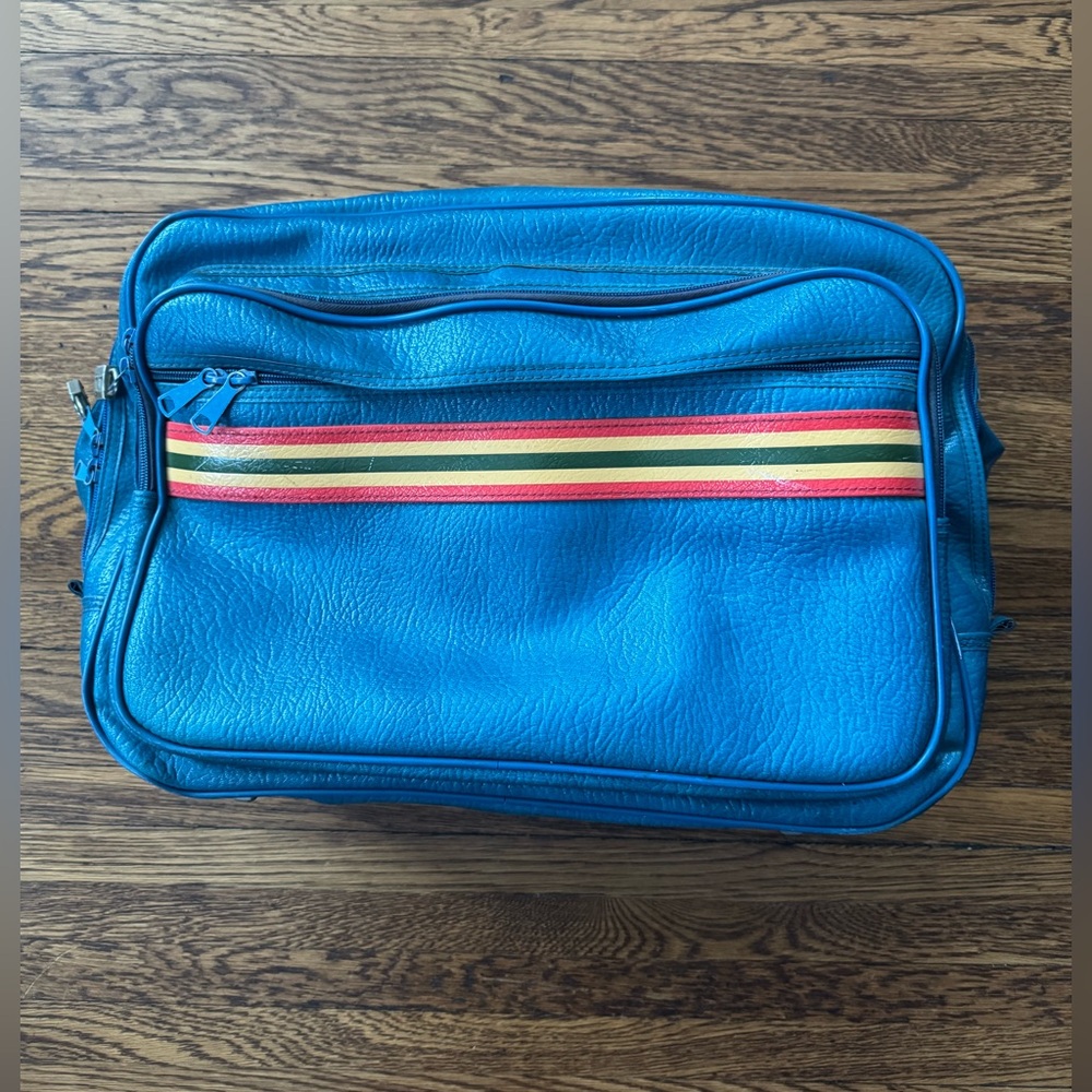Amelia Erhart Stripes Vintage Ventura duffel bag Luggage Color is Cosmetic Blue